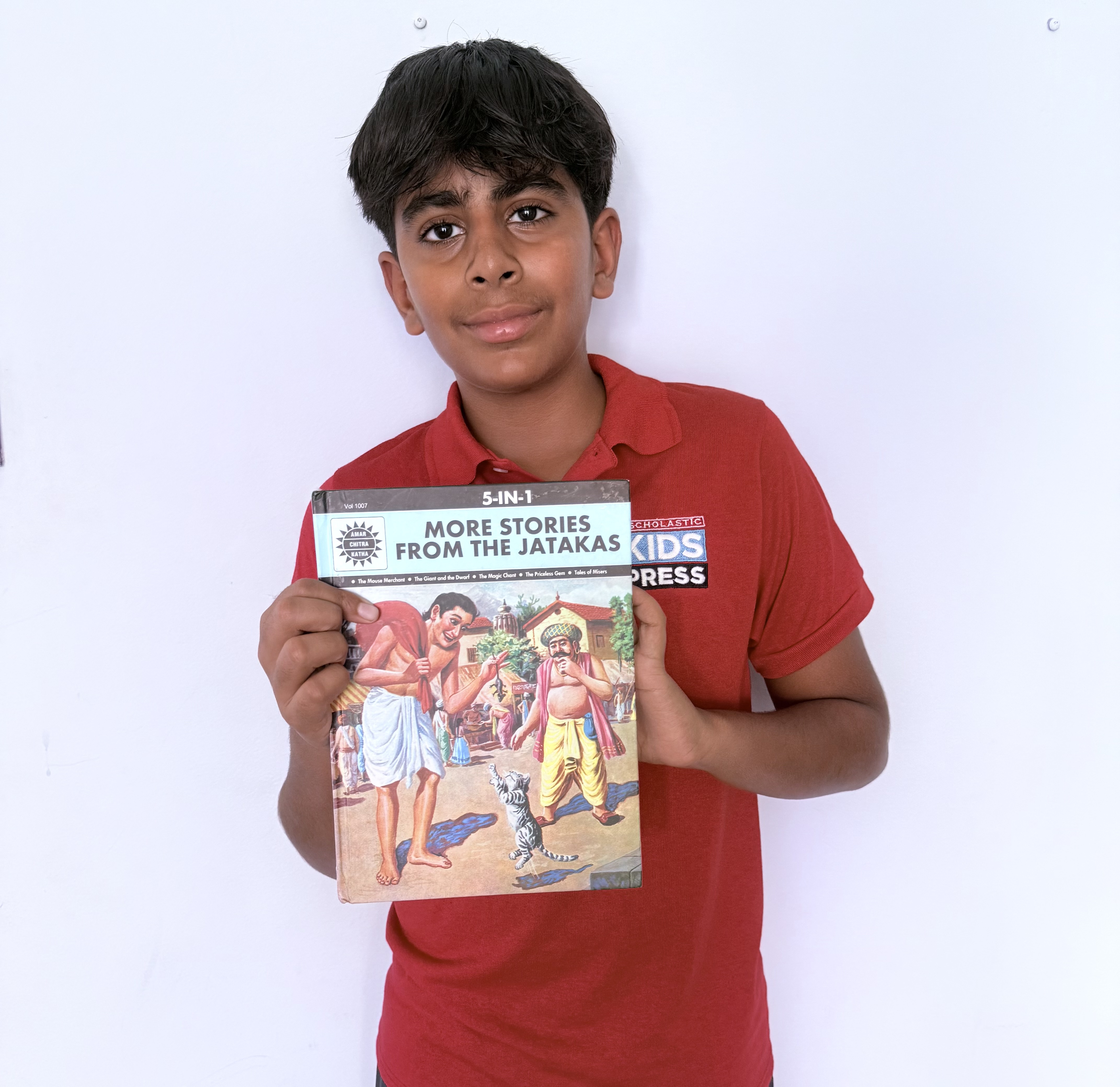 Aarish holding a copy of an ACK comic (photo credit: Sonia Hirdaramani)