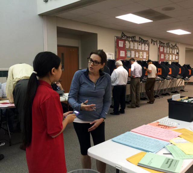 Bridget interviews Lori Petrone, a volunteer at a polling place in Austin, Texas.