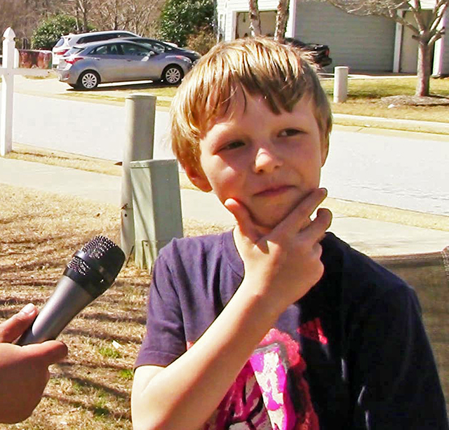 Genesis with Ethan Thompson, 8, who contemplates what he's looking for in a presidential candidate