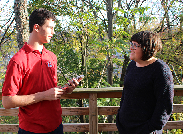 Erik talks with Elisa Jones who is visiting the U.S. from Wales. 