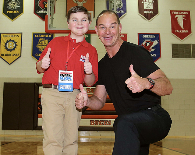 Nolan with professional photographer Aaron Josefczyk between assignments in Medina, Ohio.