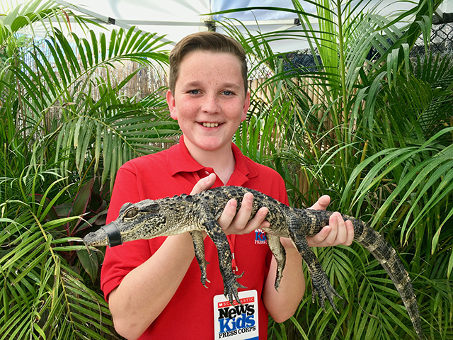 Ryan holding an alligator