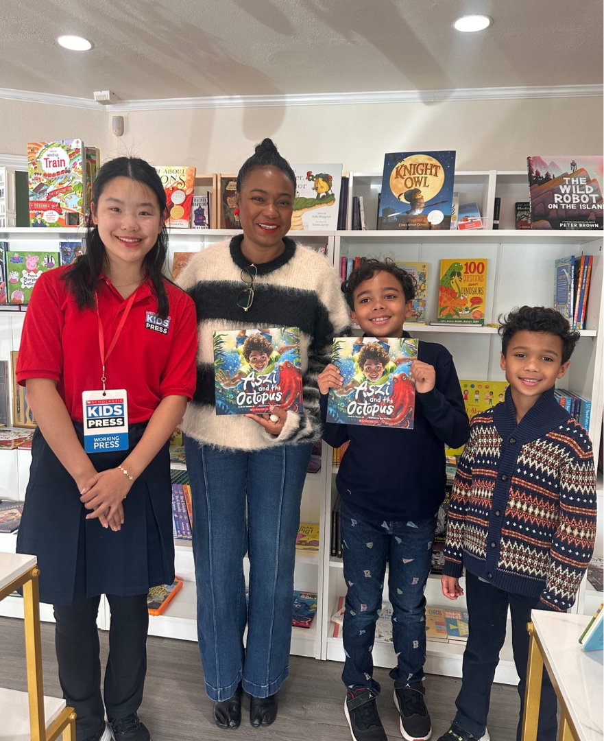Kid Reporter Enya Yang with author and actress Tatyana Ali and her sons. 
