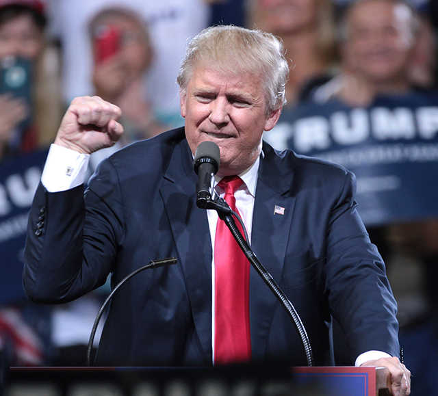 Donald Trump speaking with supporters at a campaign rally. Photo by Gage Skidmore