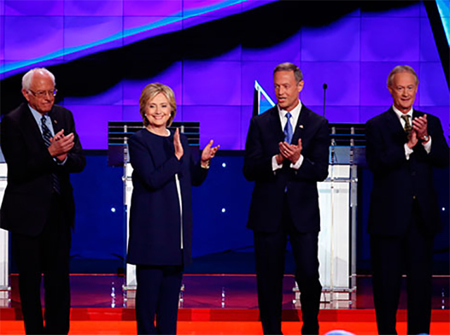 Democratic presidential candidates applaud after the national anthem at the party’s first debate on October 13 in Las Vegas, Nevada. Left to right: Vermont Senator Bernie Sanders, former Secretary of State Hillary Clinton, former Maryland Governor Martin O'Malley, and former Rhode Island Governor Lincoln Chafee.