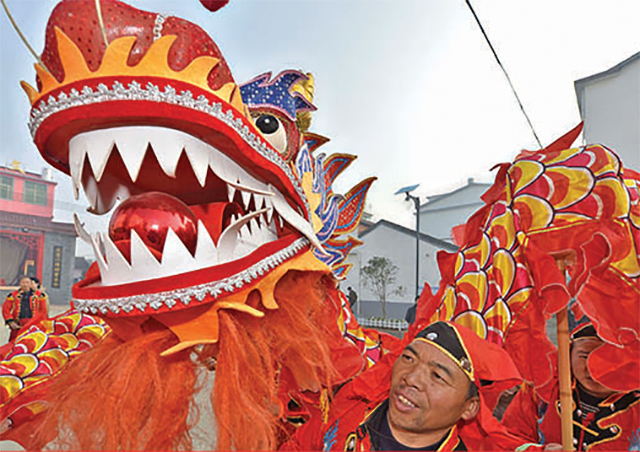 Villagers in China’s Jiangxi province perform a traditional dragon dance to celebrate the Lunar New Year.