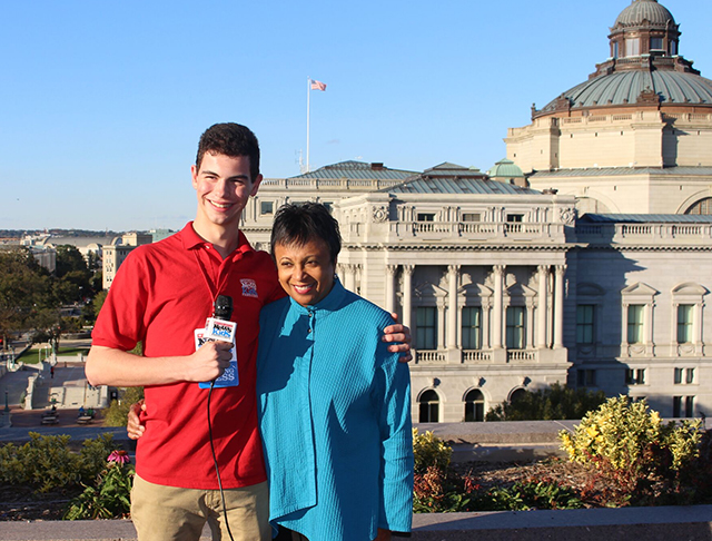 Kid Reporter Erik Weibel with Carla Hayden, the new librarian of Congress, outside the Library of Congress in Washington, D.C. The library was established by an act of Congress in 1800.