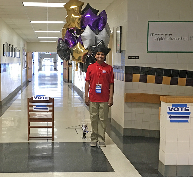 Manu at a polling place in Virginia on Super Tuesday