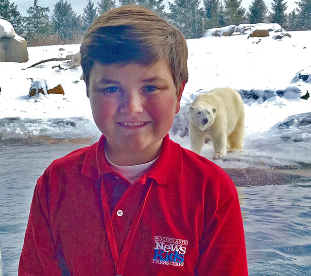 Nolan visits the Polar Frontier area of the Columbus Zoo and Aquarium.  In the background is Aurora, one of five polar bears at the zoo.  Aurora gave birth to twin cubs (Neva and Nuniq) at the zoo in November, 2016. The Columbus Zoo is the only zoo in North America to have polar bear cubs born in 2016.