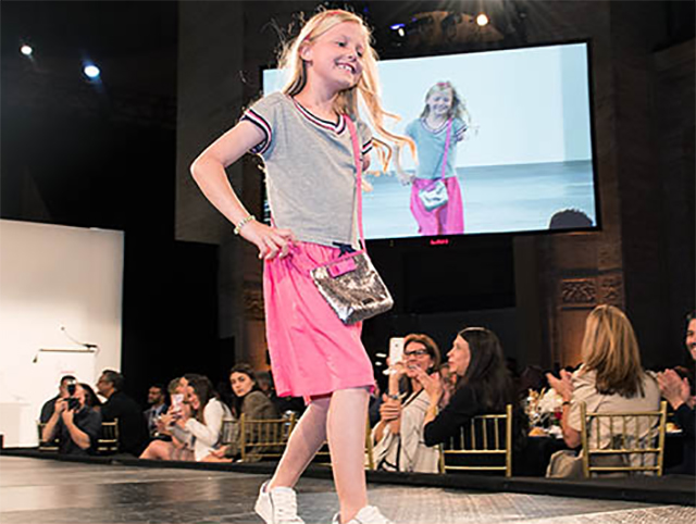 Maddie Hostetter models an outfit at a fashion show in New York City benefiting the Runway of Dreams Foundation. The organization helps bring adaptive clothing to differently abled people.