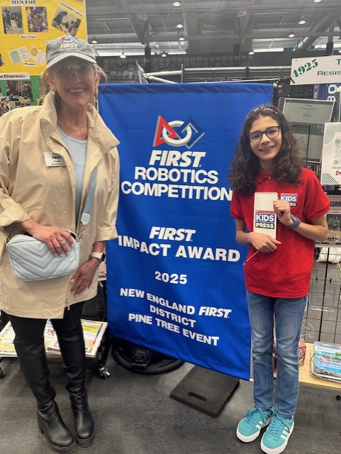 Aria with a staff member from the FIRST Robotics Competition Aria with a staff member from the FIRST Robotics Competition