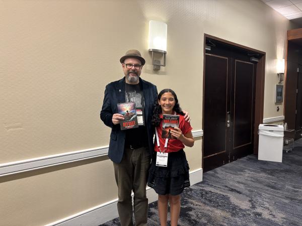 Scholastic Kid Reporter Sara Adibi pictured with Alan Gratz, author of War Games Scholastic Kid Reporter Sara Adibi pictured with Alan Gratz, author of War Games