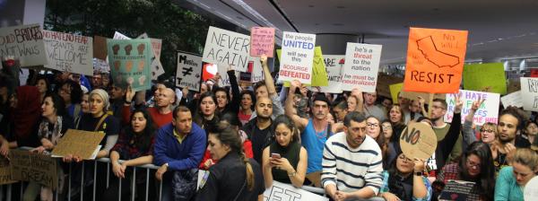 Protesters at San Francisco International Airport greet arriving travelers on January 27, the day that President Trump imposed strict limits on immigration. Protesters at San Francisco International Airport greet arriving travelers on January 27, the day that President Trump imposed strict limits on immigration.