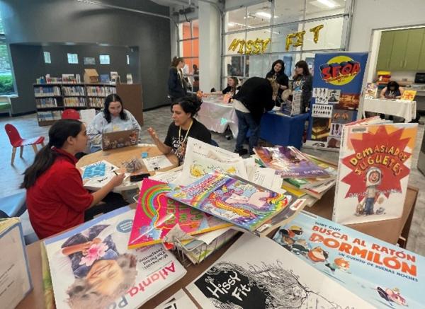 Shadia Amin speaking to Sofi Cortes about using events such as the Hissy Fit Mini Comics Fest to help students succeed. Shadia Amin speaking to Sofi Cortes about using events such as the Hissy Fit Mini Comics Fest to help students succeed.