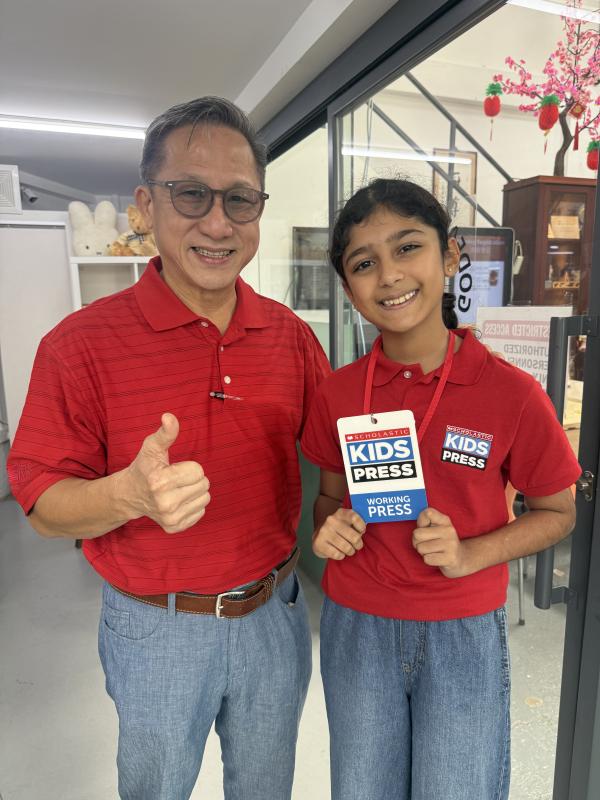 Scholastic Kid Reporter Rheya Agarwal with Project Dignity Founder, Koh Seng Choon Scholastic Kid Reporter Rheya Agarwal with Project Dignity Founder, Koh Seng Choon