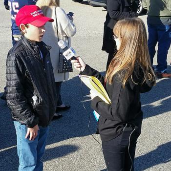 Kaitlin interviews a Trump supporter at rally in rally in Portsmouth, New Hampshire