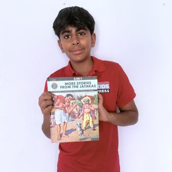 Aarish holding a copy of an ACK comic (photo credit: Sonia Hirdaramani)