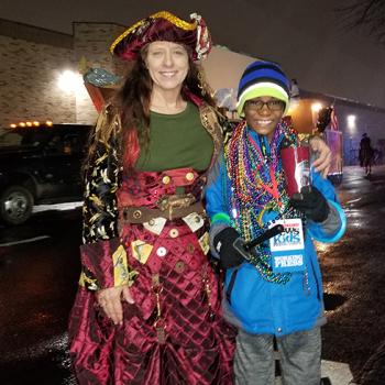 Owen with Helen Phares, captain of a Mardi Gras krewe and coordinator of the Children’s Parade in Bossier City 