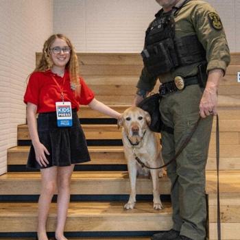 Coco with K-9 handler and trainer Officer Derek P. and K-9 Beethoven