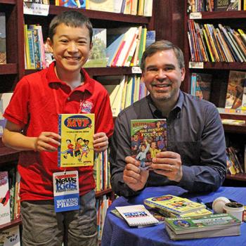 Max with David Kelly at a book-signing event in Dedham, Massachusetts