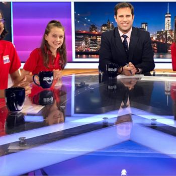 Left to right: Kid Reporters Christina Lilavois, Amelia Poor, and Charlotte Fay discuss the New York City mayoral race with NY1 news anchor Josh Robin.