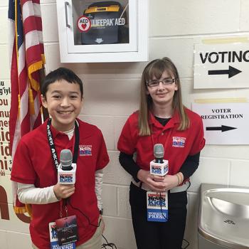 Maxwell Surprenant and Kaitlin Clark at a polling place