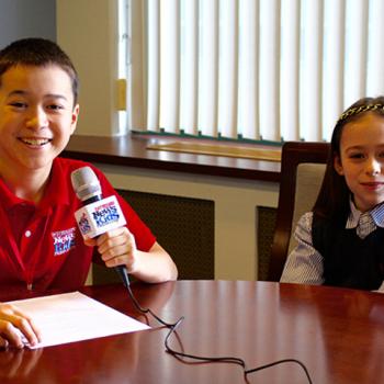 Maxwell interviews young reporter Shayna Rose in Boston. 