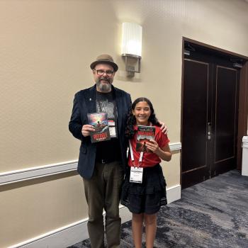 Scholastic Kid Reporter Sara Adibi pictured with Alan Gratz, author of War Games