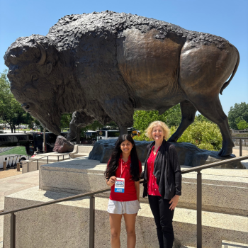 Scholastic Kid Reporter Leyla Saldanha standing in front of a bronze bison statue with Siobhan Starrs, Exhibition Developer and Project Manager at the Smithsonian. Scholastic Kid Reporter Leyla Saldanha standing in front of a bronze bison statue with Siobhan Starrs, Exhibition Developer and Project Manager at the Smithsonian.
