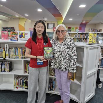 Kid Reporter Josephine Lee pictured with Ms. Sewall. Elementary School Librarian at Chadwick International School