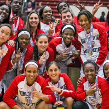 Hoop star Maria Alvarez (front row, second from left) celebrates with her Miami Country Day teammates after winning the DICK’s Sporting Goods High School Nationals on April 4 at Madison Square Garden.