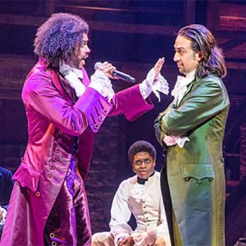 Daveed Diggs (front left), Lin-Manuel Miranda (front right), and other cast members perform in Miranda’s Hamilton: An American Musical at the Richard Rodgers Theater in New York City.