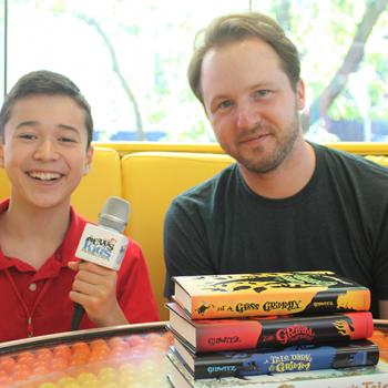 Maxwell with author Adam Gidwitz at Dylan’s Candy Bar in New York City