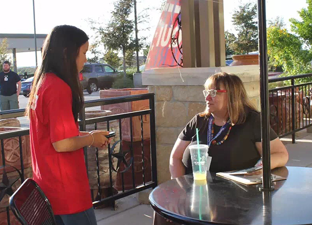 Bridget speaks with Joan Carr, a local poll worker