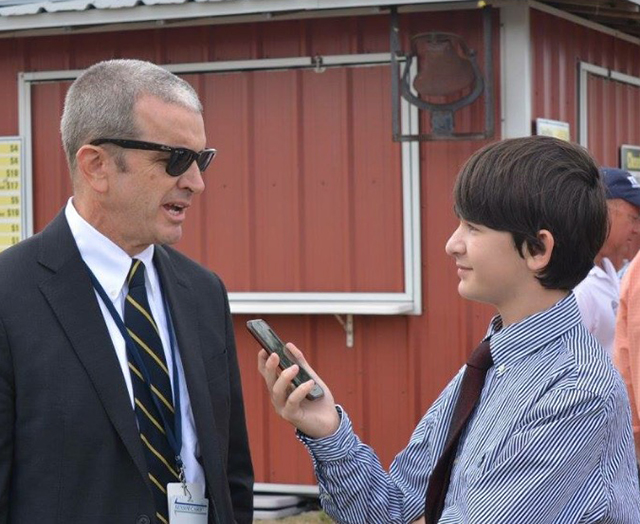 Benjamin interviewing George Bennett of the Palm Beach Post